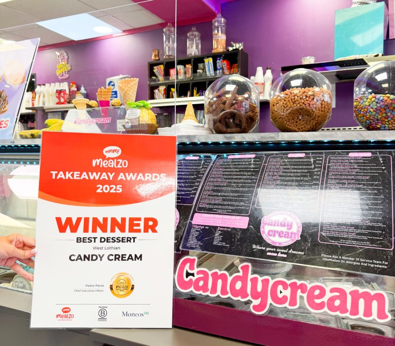 Candy Cream Bathgate award certificate for Best Dessert presented by Mealzo, 
displayed inside the shop