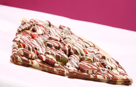 Golden Brown waffle from Candy Cream dessert shop in Bathgate, served warm 
with cream and toppings